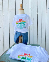 Load image into Gallery viewer, “I don’t know how to act my age “ SHORT SLEEVE T-shirt. CLEARANCE
